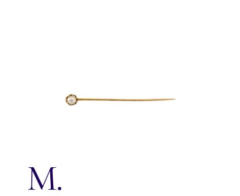 NO RESERVE - A Stick Pin in yellow gold, the terminal a claw set pearl. (Unmarked but tests indicate 18ct gold.) Size: 6cm We