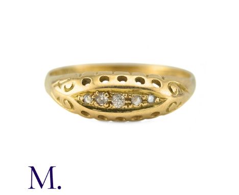 An Antique Diamond Five Stone Ring in 18k yellow gold, set with round cut, rose cut and old cut diamonds. Partially Hallmarke
