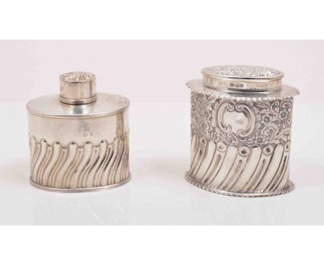A Victorian oval silver tea caddy, by Nathan and Hayes, Birmingham 1893, semi-gadrooned and another oval caddy by William Hut