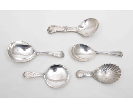 A George III silver caddy spoon, by Joseph Taylor, Birmingham 1797, scallop bowl, a George IV Kings pattern caddy spoon by Jo
