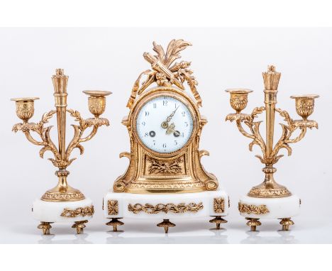 Louis XV style gilt metal and white marble three-piece clock garniture, clock drum surmounted by foliage and a quiver, bow fr