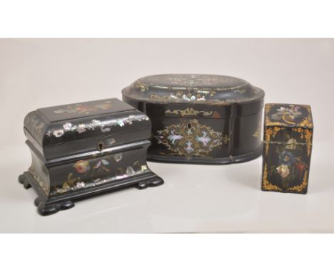 A William IV black lacquered papier mache bombe shape tea caddy, mother of pearl and painted floral decoration, raised on fou