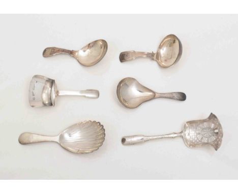 A George IV silver shovel shape caddy spoon, by John Bettridge, Birmingham 1825, Fiddle pattern, a George III shovel shape ca