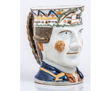 A Prattware "Admiral Rodney" mug, probably late 18th Century, modelled as the naval commander's head and shoulders, his braid