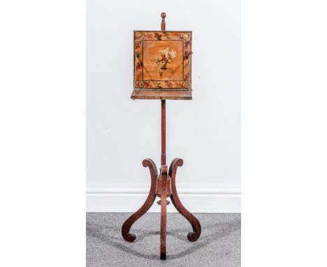 A George III mahogany fire screen, faux satinwood and painted panel with a flap (rubbed and worn), mahogany pedestal, tripod 