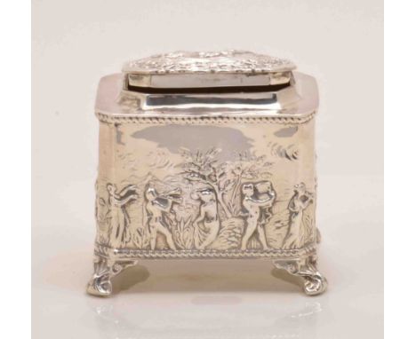 A Late Victorian silver caddy box, by Thomas Hayes, Birmingham 1898, oblong form with canted corners, embossed decoration of 