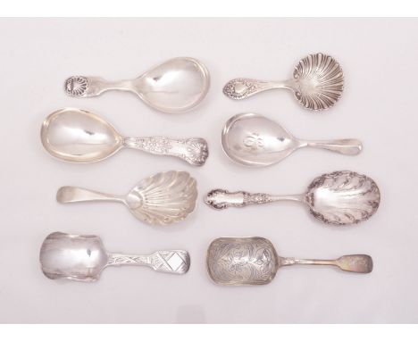 A Victorian silver caddy spoon, by Charles Boyton, London 1858, Kings pattern, another by George Adams, London 1864 and six o