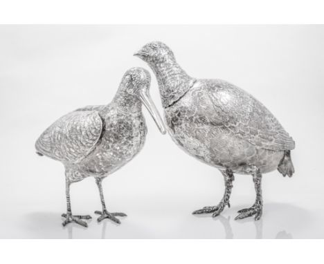 A German silver flask, designed as a grouse, Berthold Muller, import marks for Chester 1906, hinged wings, 23oz, 27cm and a s