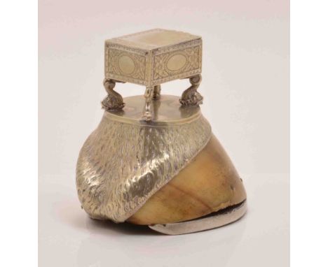 A Victorian electroplated horse hoof snuff box, rectangular box with fish formed supports, engraved decoration, 14cm.