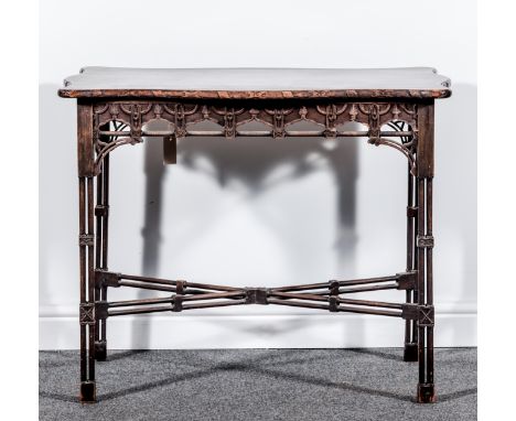 A Chinese Chippendale style mahogany and stained beechwood centre table, circa 1900, serpentine outlines with rosette and rib