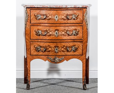 A Louis XV style kingwood and marquetry serpentine petite commode, early 20th Century, marble top, fitted with three drawers,