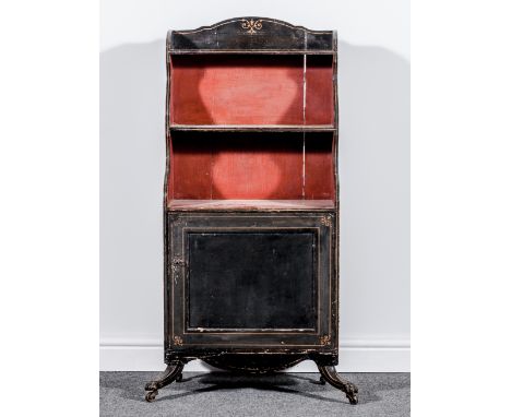 A Regency painted "waterfall" bookcase chiffonier, black and cinnabar painted with painted stringing, two open shelves over a