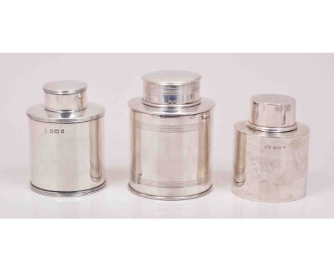 A cylindrical silver tea caddy, by Deakin & Francis Limited, Birmingham 1911 and two others by Ellis Jacob Greenberg, Birming