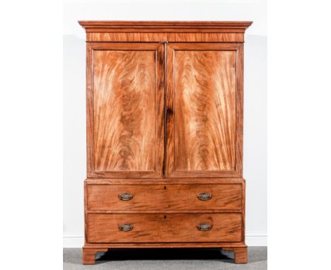 A George IV mahogany press cupboard, ogee moulded cornice, plain frieze, two panel doors to the upper section with two long d