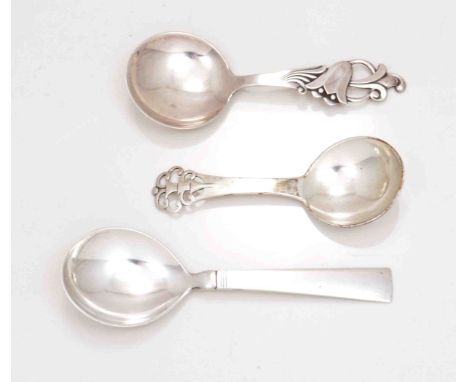 A Danish silver caddy spoon, by S Jacobsen, pierced scroll decoration to the handle, a Danish spoon by Georg Jensen and a Nor