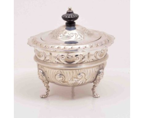 An Edwardian silver covered sugar basin, by Joseph Rodgers, Sheffield 1908, embossed scrolled decoration, lion mask and pad f