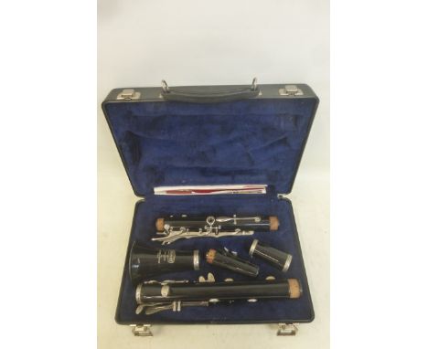 A cased Bundy clarinet.