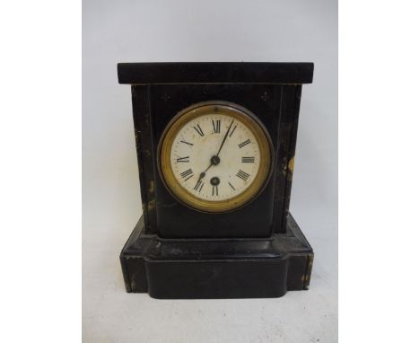 An Edwardian slate mantle clock.