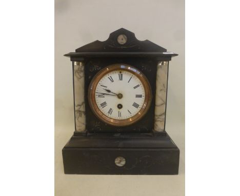 AVictorian slate and marble mounted mantle clock. 