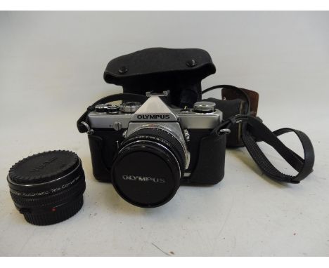 An Olympus camera with two lenses.