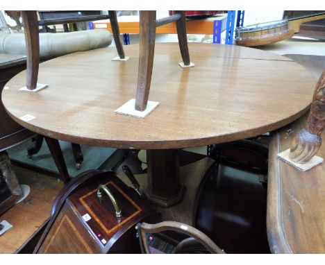 A 19th Century mahogany circular tilt top breakfast table raised upon a tripod base. 