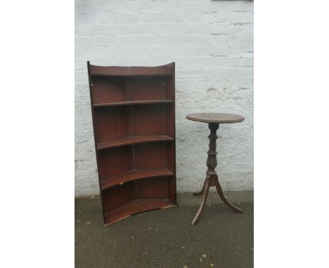 A mahogany and pine corner bookshelf and a tripod wine table.