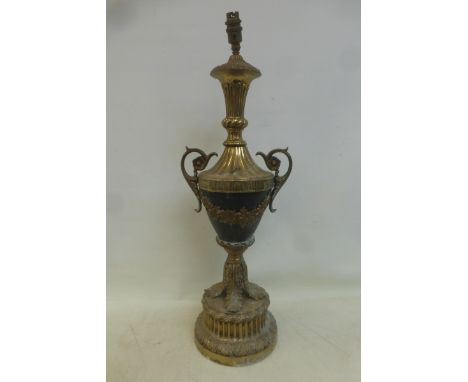 A decorative brass table lamp of classical design. 