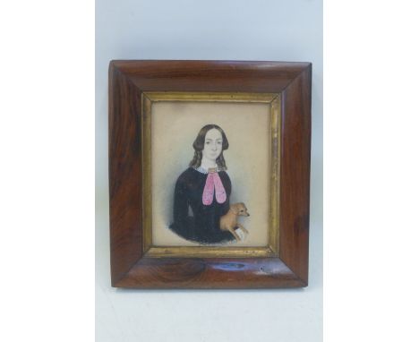 A naive school portrait miniature depicting a girl with a terrier, signed W. Murray and dated 1849.