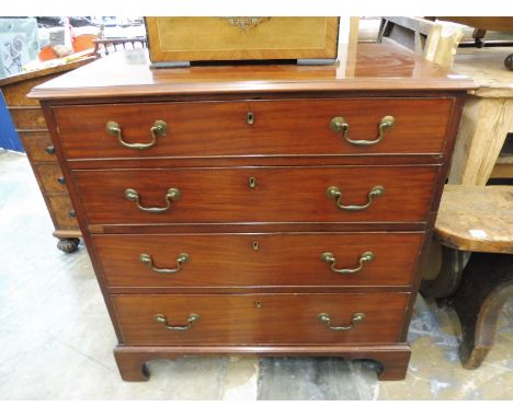 A George III well figured mahogany chest of four long drawers to bracket feet.