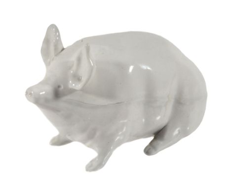 A Wemyss white piglet, circa 1890, impressed mark 'WEMYSS', 16.5cm long  A Wemyss white piglet, circa 1890,   impressed mark 