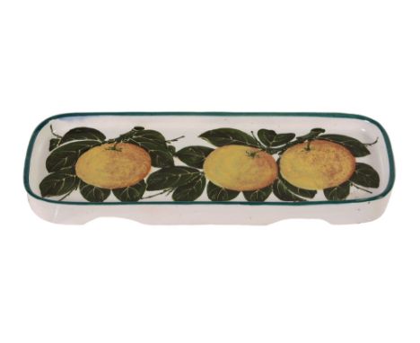 A Wemyss pen tray, circa 1900, painted with branches of oranges, impressed  A Wemyss pen tray, circa 1900,   painted with bra