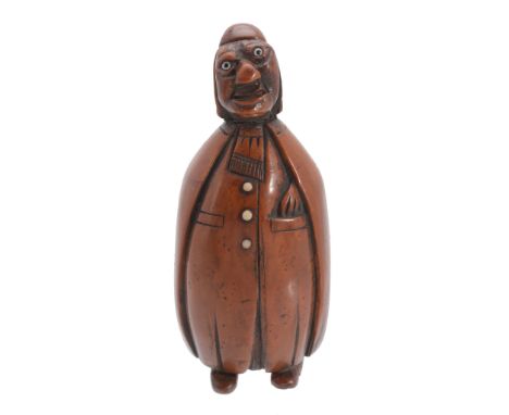 A French coquilla nut novelty snuff box, circa 1790  A French coquilla nut novelty snuff box,   circa 1790, carved as a man i