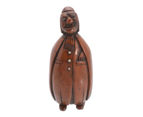 A French coquilla nut novelty snuff box, circa 1790  A French coquilla nut novelty snuff box,   circa 1790, carved as a man i