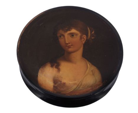 A paper mache circular snuff box, circa 1820  A paper mache circular snuff box,   circa 1820, the cover painted with a young 