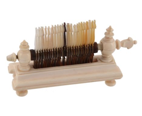 A Regency turned ivory table top gaming recorder, circa 1820  A Regency turned ivory table top gaming recorder,   circa 1820,