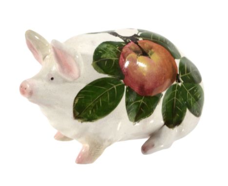 A rare Wemyss Piglet, circa 1900, painted with branches of apples  A rare Wemyss Piglet, circa 1900,   painted with branches 