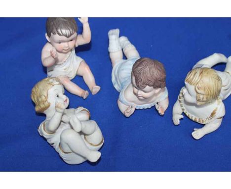 FOUR BISQUE PORCELAIN FIGURES OF CHILDREN 