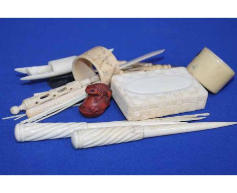 LOT OF EARLY 20TH CENTURY IVORY ITEMS
including two twist design hair pins, a carved wicker work style ivory box, gameing pin