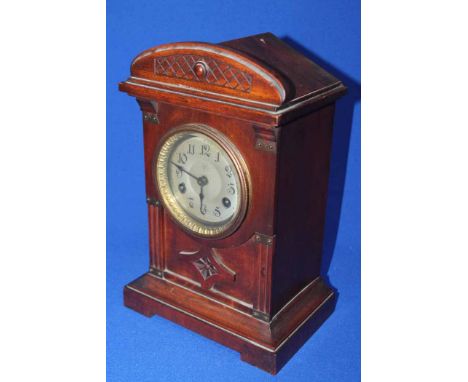 LATE VICTORIAN MANTEL CLOCK
the silvered dial inscribed Junghans 