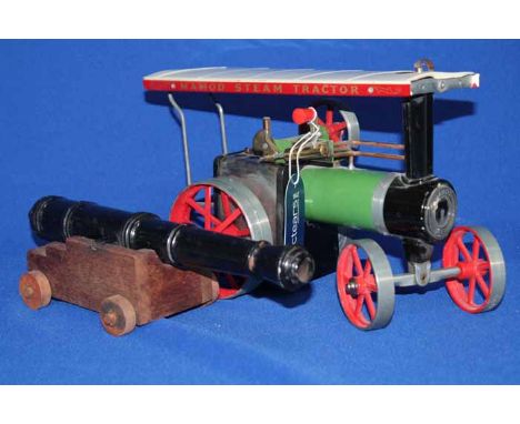 MAMOD LIVE STEAM ENGINE TRACTOR
model number T.E. 1A; together with a reproduction of a signaling canon