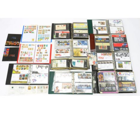 POSTAGE STAMPS. AN EXTENSIVE COLLECTION OF GREAT BRITAIN FIRST DAY COVERS AND PRESENTATION PACKS IN NINE BINDERS AND A SMALLE