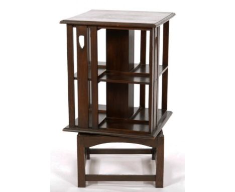 AN ARTS AND CRAFTS GLASGOW STYLE STAINED OAK ROTATING BOOKCASE, C1905, ON SQUARE BASE, 90CM H, 50 X 50CM ++ATTRACTIVELY PATIN