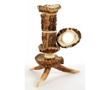 AN UNUSUAL ANTLER HAND CANDLESTICK, 17CM H, PROBABLY GERMAN, LATE 19TH C