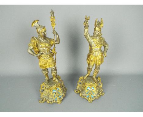Two cast metal sculptures the first depicting a Roman Standard Bearer, the other a Gaulish warrior, each raised on scrolled b