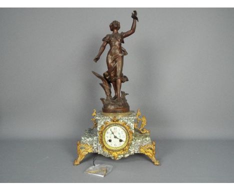 An early 20th century French figural mantel clock, the case of pale green and white marble, with cast and gilded decoration, 