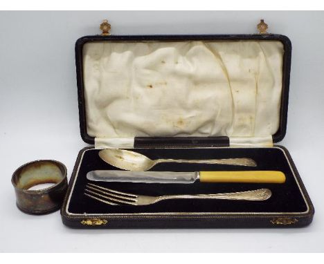 George V hallmarked silver spoon and fork (knife is stainless) contained in fitted case, Birmingham assay 1932 and a silver n