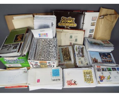 Philately - A collection of loose stamps, covers, first day covers, album of mint stamps, philatelic literature and similar.