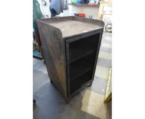 A vintage industrial metal cabinet 