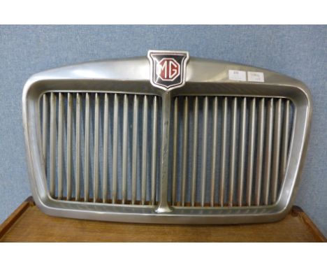 A vintage chrome M.G. car radiator grille 