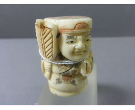 Oxbone Netsuke of a Man with Fan